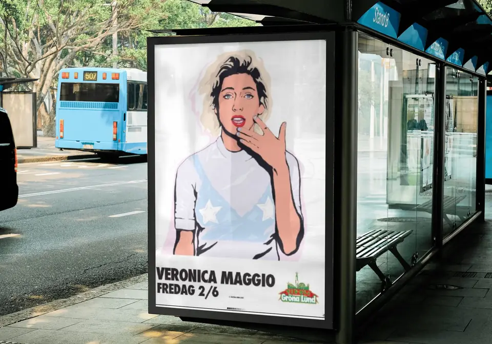 Koncertplakat i et busskur