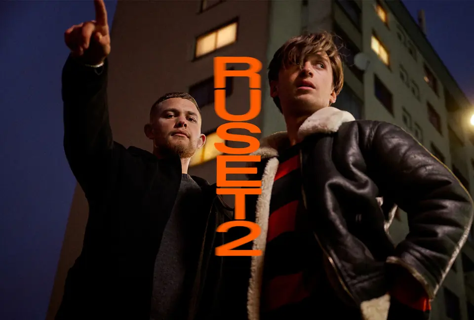 Campaign image for Ruset season 2 with an orange logo